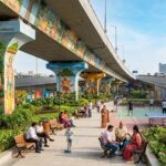 Government partners with private sector to create eco-friendly spaces beneath Delhi flyovers.