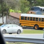 VIDEO: School Bus Driver Taken into Custody for Steering Vehicle onto Train Tracks