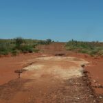 Impassable roadway threatens survival of isolated community as food resources diminish