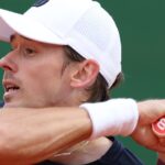 Alex de Minaur defeated by home favorite in Monte Carlo Masters showdown.