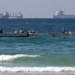 US Warships Navigate Strait of Hormuz for Mine-Clearing Operations; Iran Asserts They Were Redirected After Warning