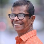 Indrans, a National Award winner at 68, overcame financial barriers to return to education, taking Class 7 exams after leaving school post-Class 4 due to uniform costs.