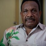 Hotel proprietor seeks $11 million lawsuit against Australia for outstanding refugee expenses.